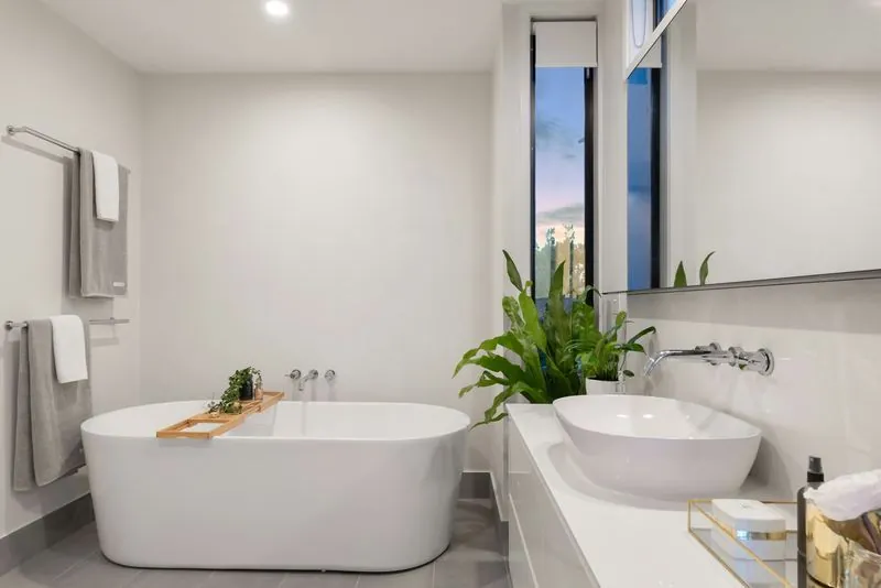 Remodeled bathroom with vanity and soaking tub