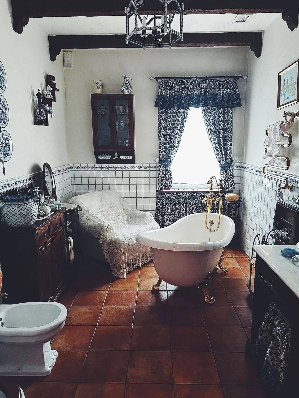 Charming vintage bathroom featuring a classic clawfoot tub and elegant decor