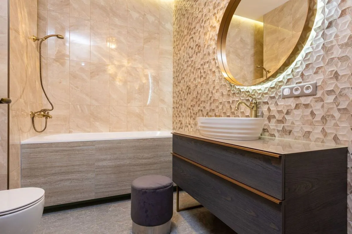Elegant modern bathroom with a stylish wooden vanity and backlit mirror.