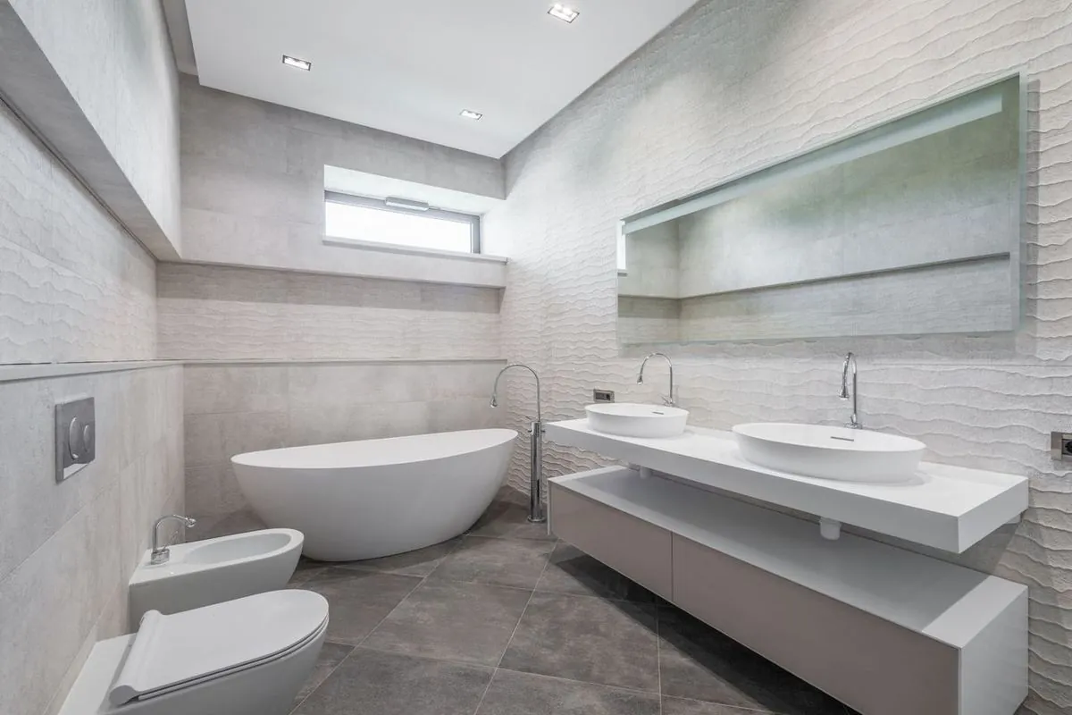 Luxurious bathroom with sleek modern fixtures and minimalist design elements.