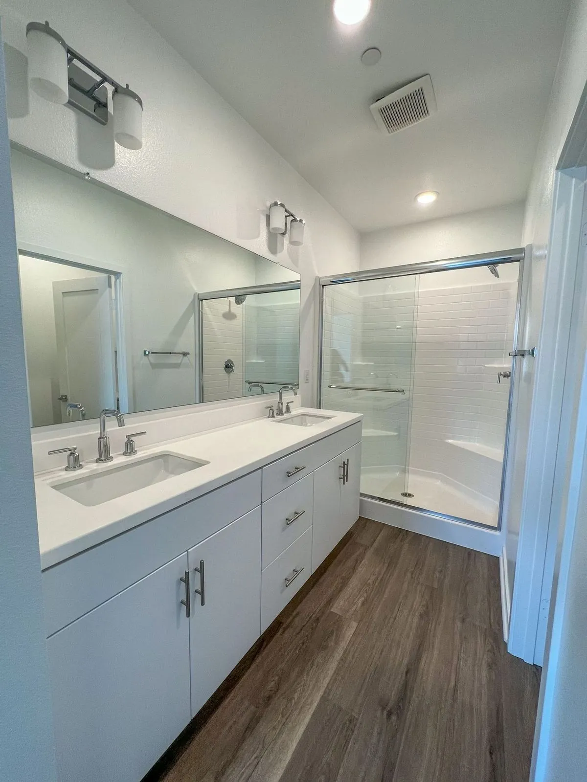 Modern bathroom interior with contemporary fixtures and clean tile finishes